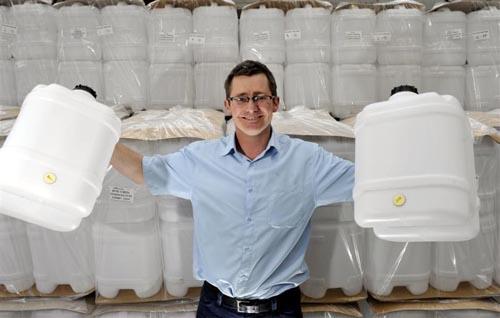 Norman with Jerry Cans